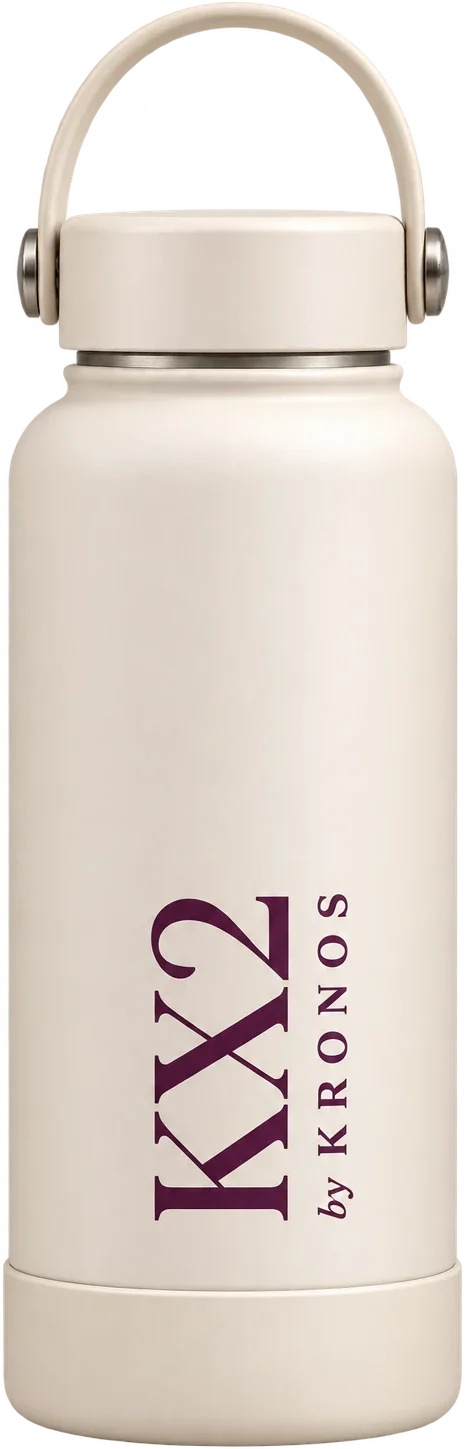 The KX2 Bottle: a 1 L cream bottle with a carry handle and the KX2 wordmark in plum.